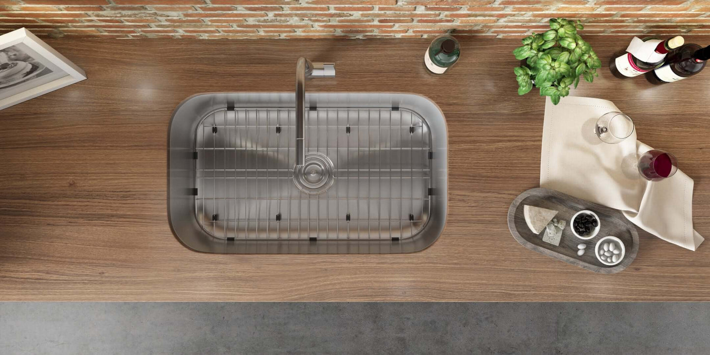 Ruvati 32" Undermount Kitchen Sink Single Bowl - RVM4200 installed in a wooden countertop with decorative items around.