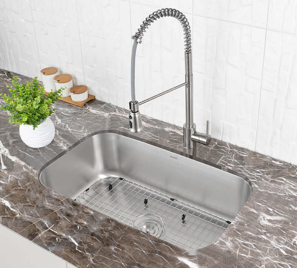 Ruvati 32" Undermount Kitchen Sink Single Bowl - RVM4200 installed in a modern kitchen with marble countertop.