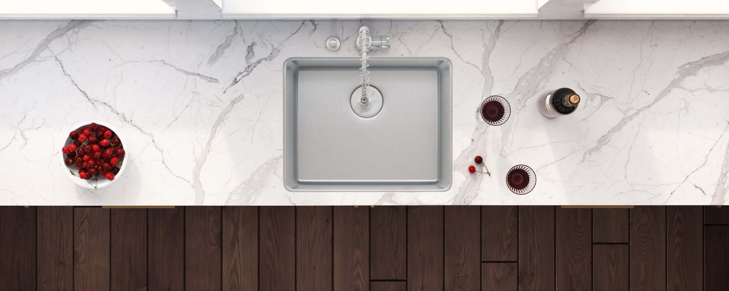 Ruvati 23" Undermount Bar Prep Kitchen Sink Single Bowl - RVM5908 on a marble countertop with a bowl of berries and wine glasses.
