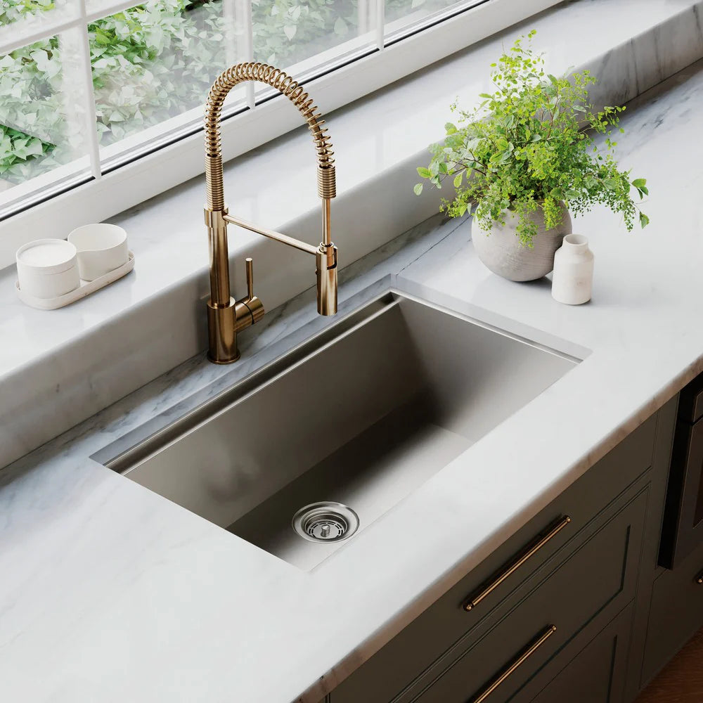 ZLINE Sierra Kitchen Faucet installed in a modern kitchen sink setup with a marble countertop.