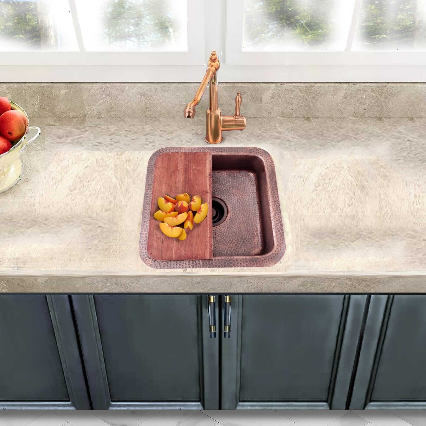 Nantucket 16.625" Copper Square Dual Mount Bar Sink and Cutting Board - SQRC-7PS on a countertop with fruits and a faucet.