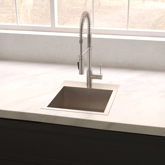 ZLINE Donner 15" Topmount Single Bowl Bar Sink in Stainless Steel (STS-15) with pull-down faucet in a modern kitchen.