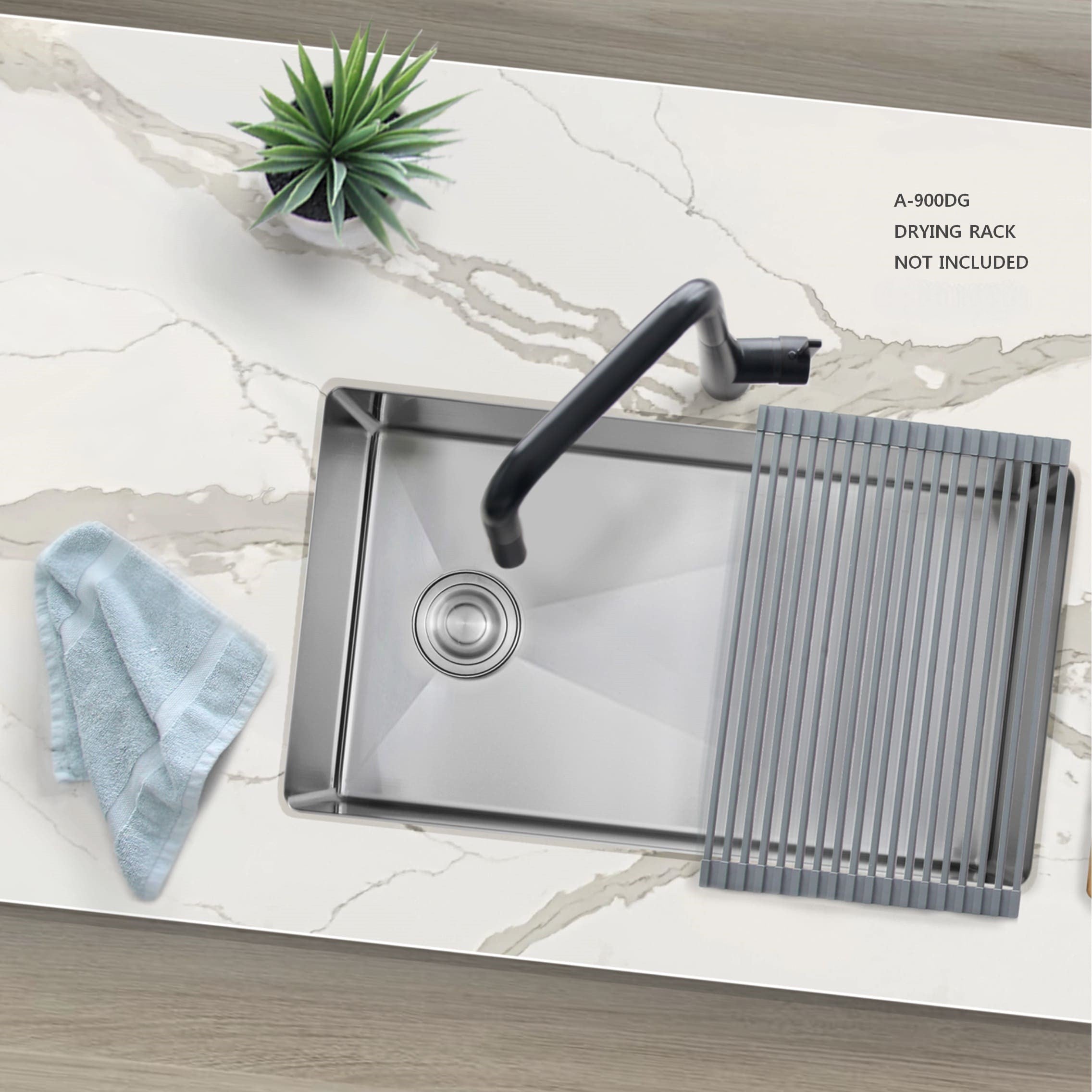 Stylish undermount stainless steel sink A-900DG shown installed on a marble coiuntertop