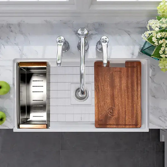 Nantucket Sinks Colander for T-PS Series Fireclay and Wellfleet Sinks - Stainless in a kitchen workstation setup.