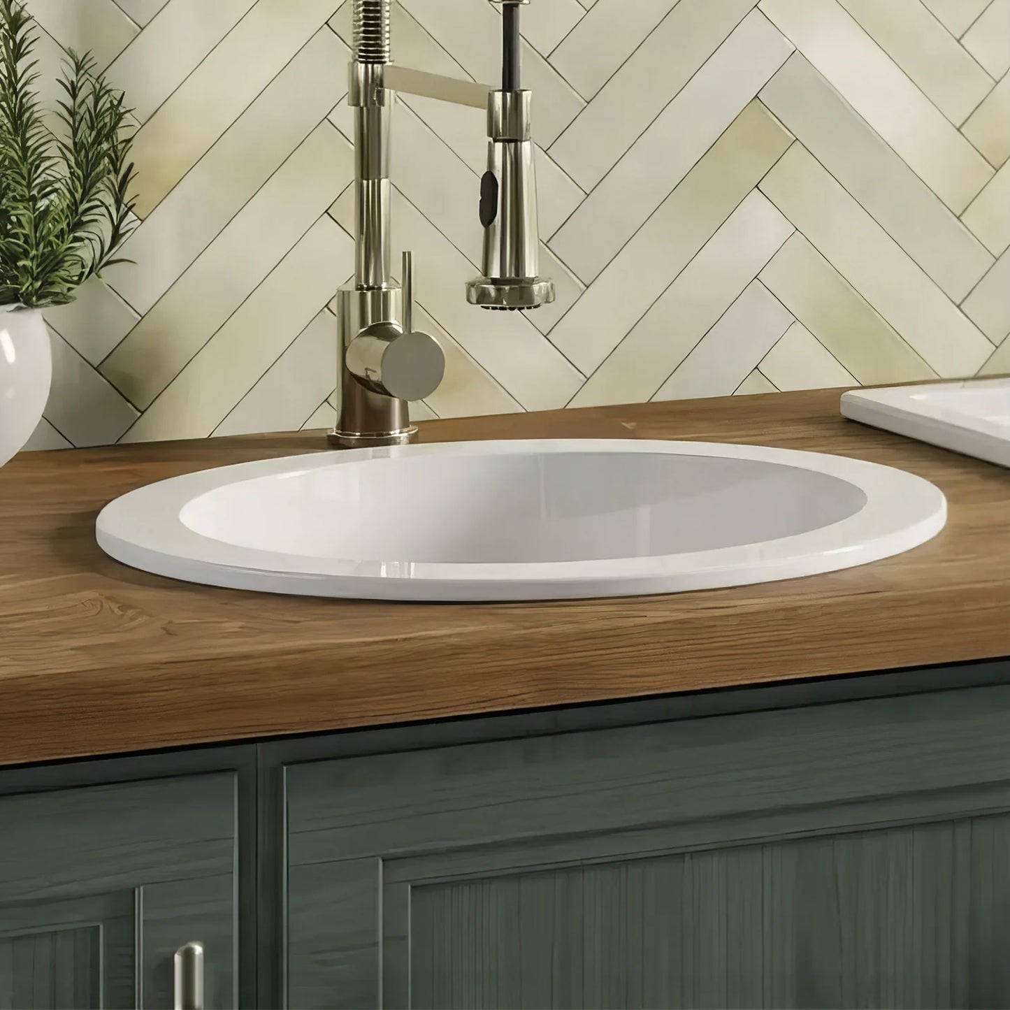 WHITEHAUS 18.25" Elementhaus Fireclay Circular Drop In/Undermount Sink with 3 ½" Rear Center Drain WHE1818R in modern kitchen