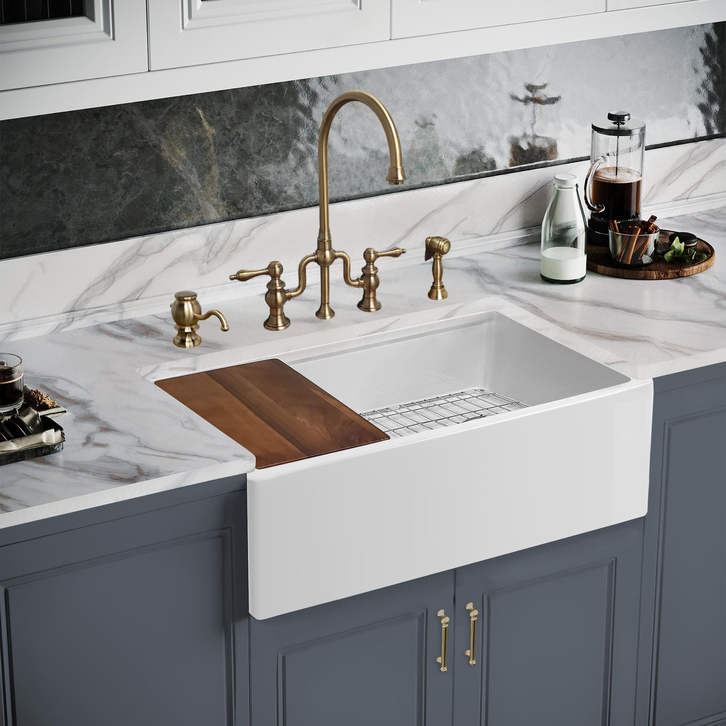 Lifestyl image of Whitehaus offset-drain fireclay farmhouse workstation sink paired with a traditional style bridge faucet