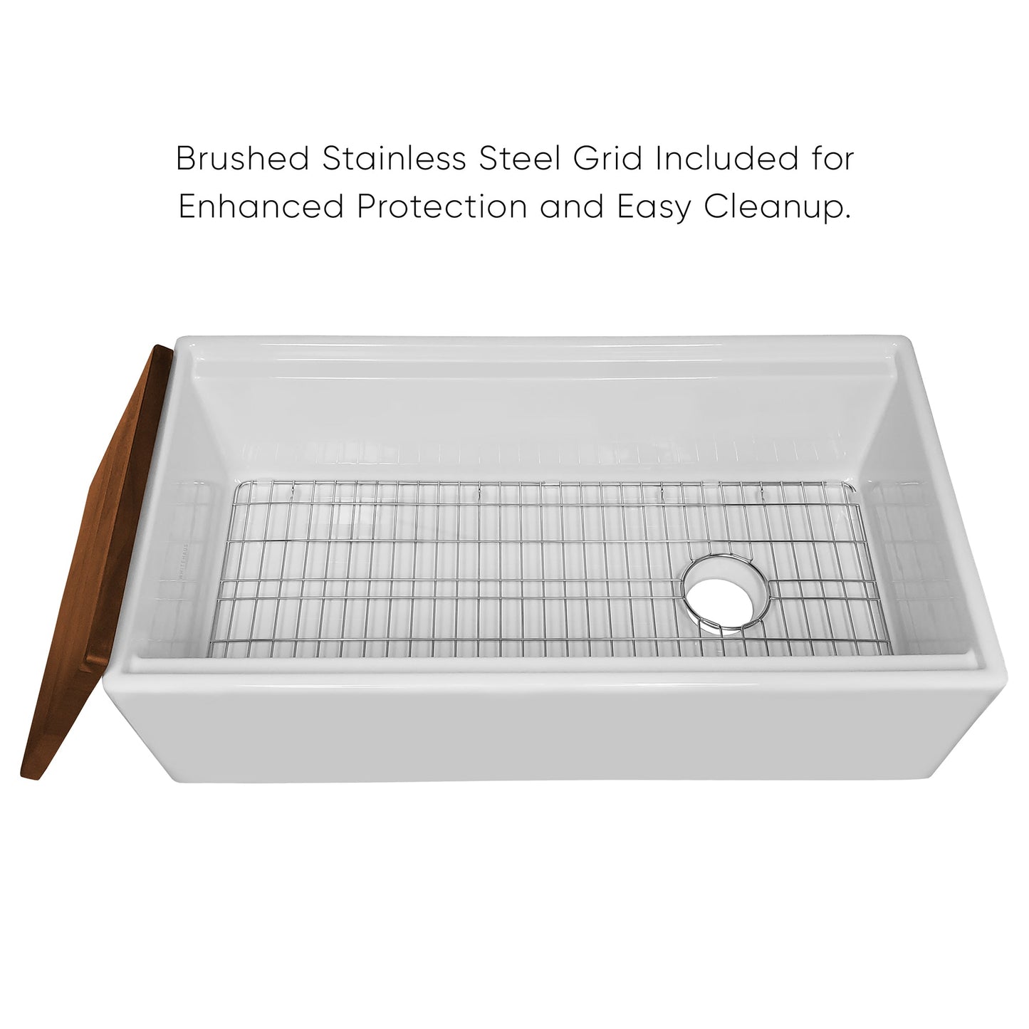 Whitehaus 36" fireclay farmhouse workstation sink showing offset drain and included bottom grid