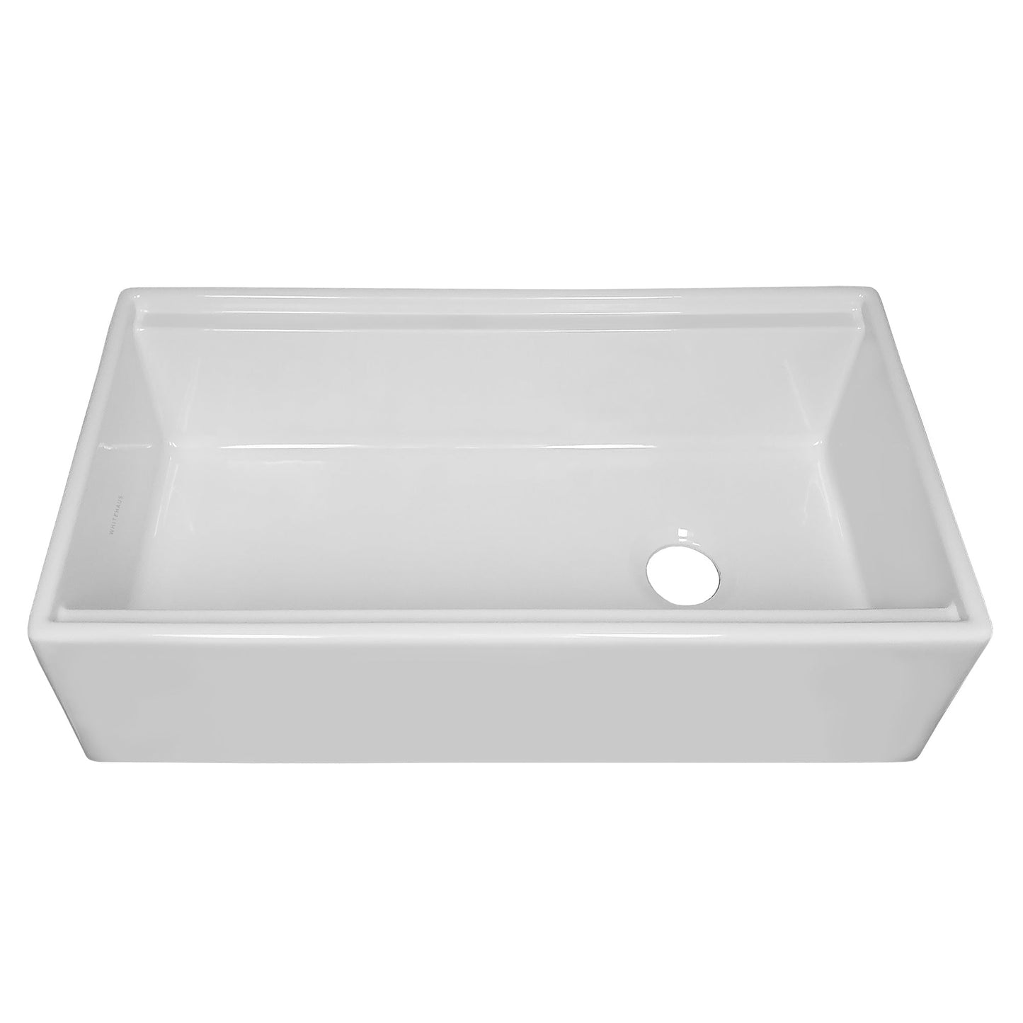 36 inch Whitehaus farmhouse fireclay kitchen sink showing offset drain and step rim for accessories