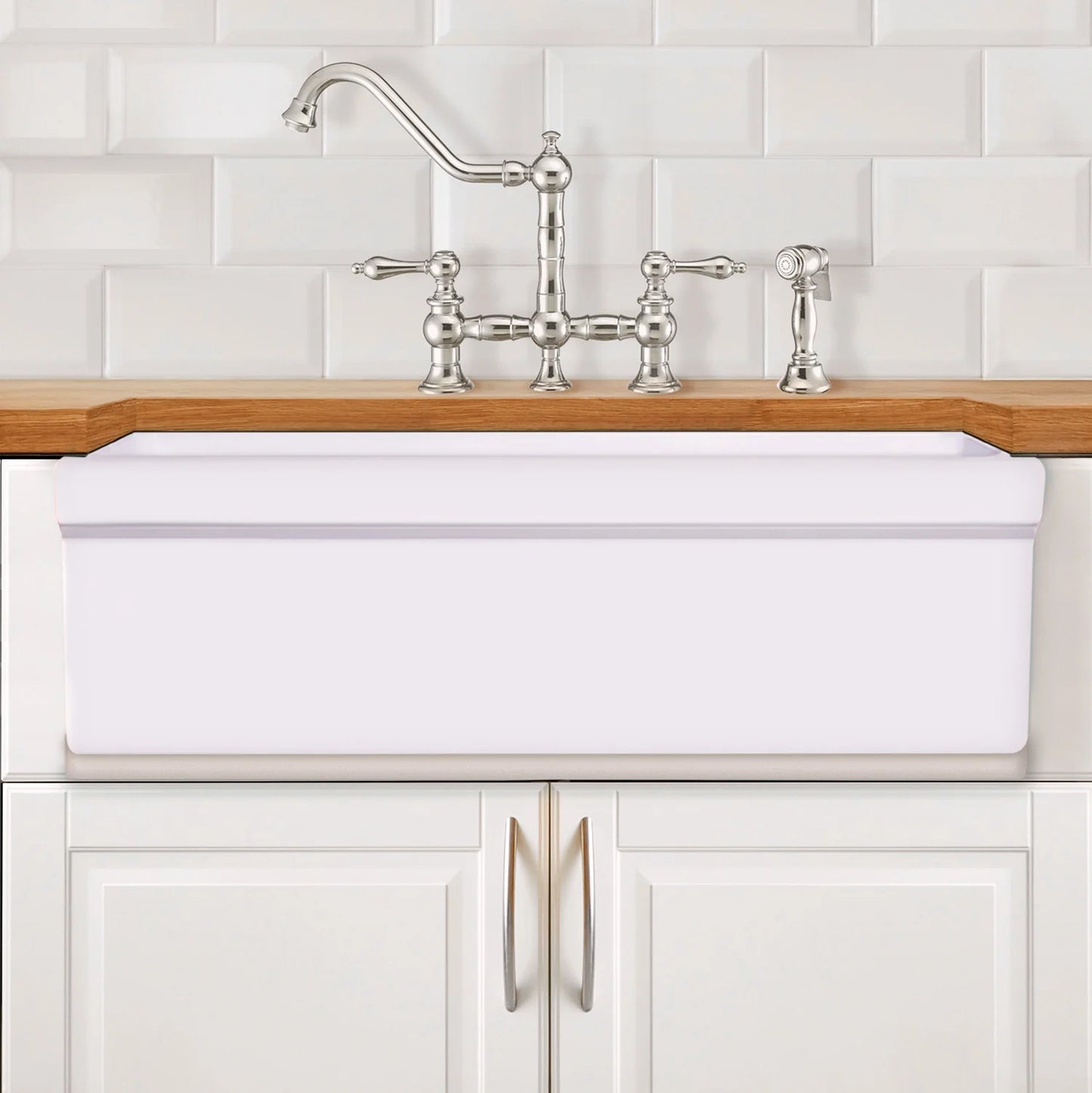 WHITEHAUS 36" Farmhaus Fireclay Quatro Alcove Large Reversible Sink installed in a modern kitchen.