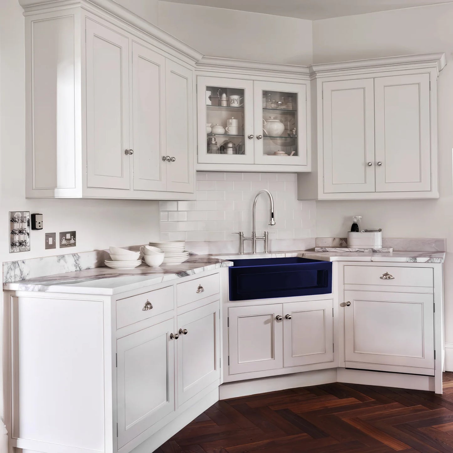 WHITEHAUS 33" Shakerhaus Reversible Kitchen Fireclay Sink WHQ5550 in a modern white kitchen.