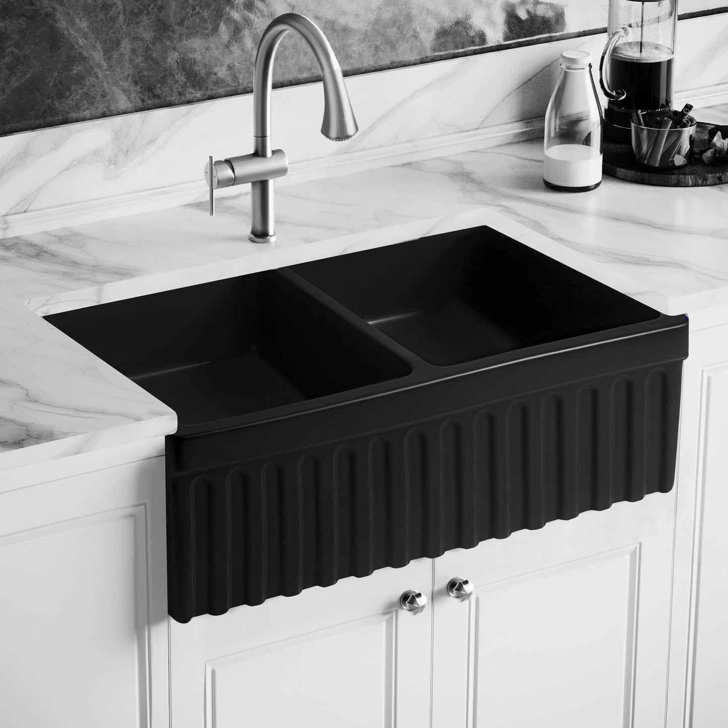 WHITEHAUS 33" Farmhaus Quatro Alcove Reversible Matte Double Bowl Fireclay Kitchen Sink WHQDB332 displayed from a side angle in a modern kitchen.