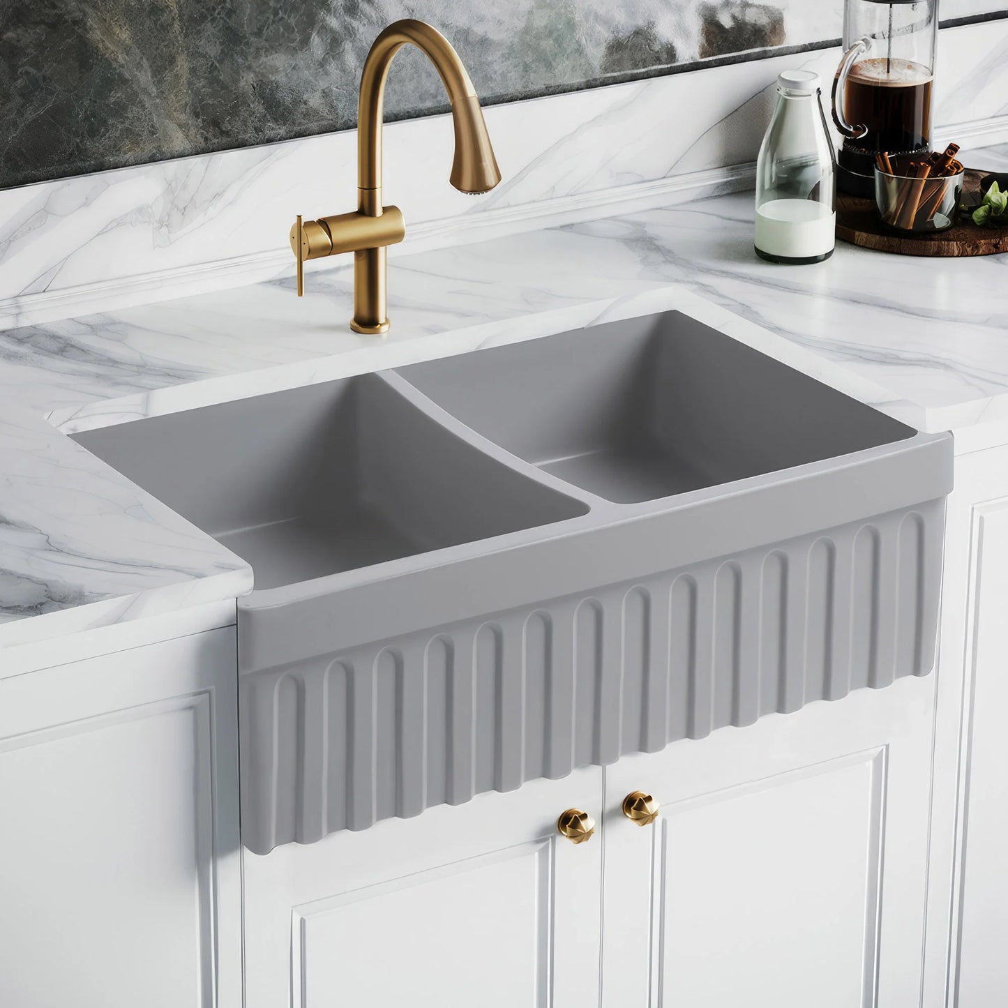 WHITEHAUS 33" Farmhaus Quatro Alcove Reversible Matte Double Bowl Fireclay Kitchen Sink WHQDB332 in a modern kitchen with marble countertop.
