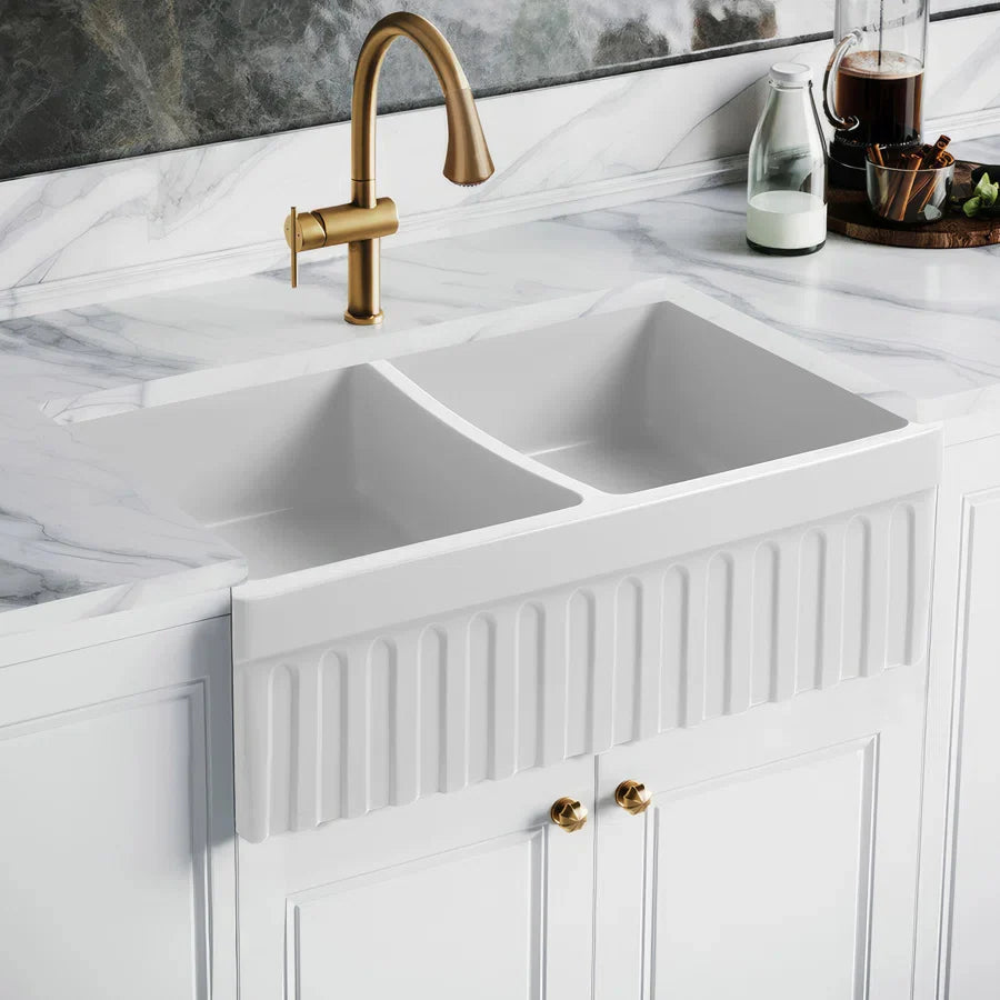 WHITEHAUS 33" Farmhaus Quatro Alcove Reversible Matte Double Bowl Fireclay Kitchen Sink WHQDB332 displayed in an elegant kitchen setting.