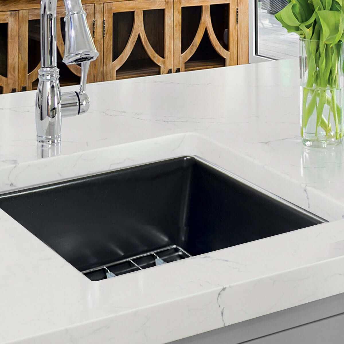 Nantucket 18" Fireclay Kitchen Sink Wellfleet-1818MB in a sleek kitchen countertop with modern faucet.
