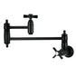 Kingston Brass KS3103ZX Millennium Wall Mount Pot Filler Faucet, Antique Brass, featuring a foldable swing arm design.