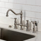 Kingston KS3277BPLBS Bel-Air Bridge Kitchen Faucet with Brass Sprayer, Brushed Brass on a kitchen sink.