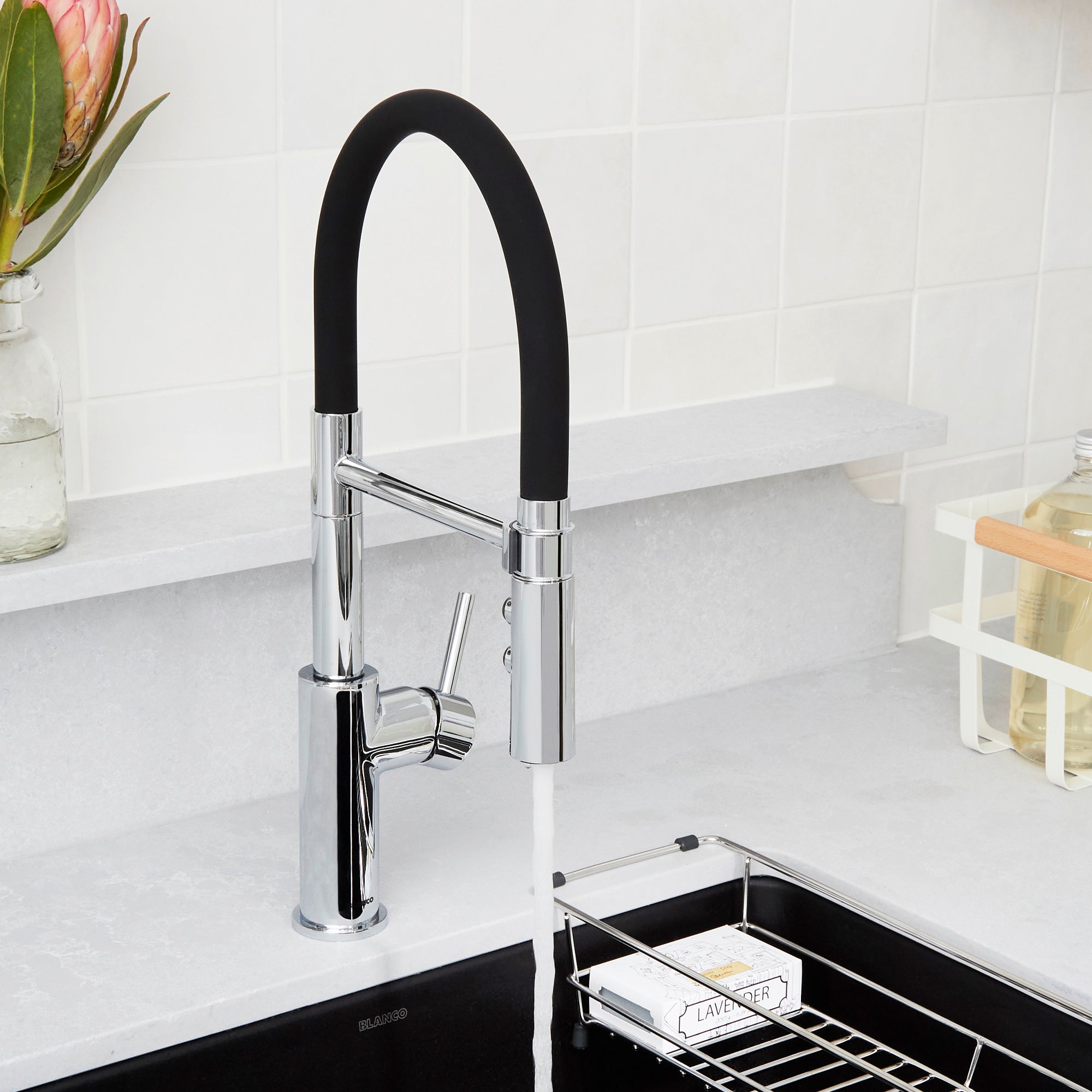 BLANCO Catris Flexo Semi-Pro Pull-Down Dual-Spray Kitchen Faucet with flexible rubber hose in modern kitchen setting