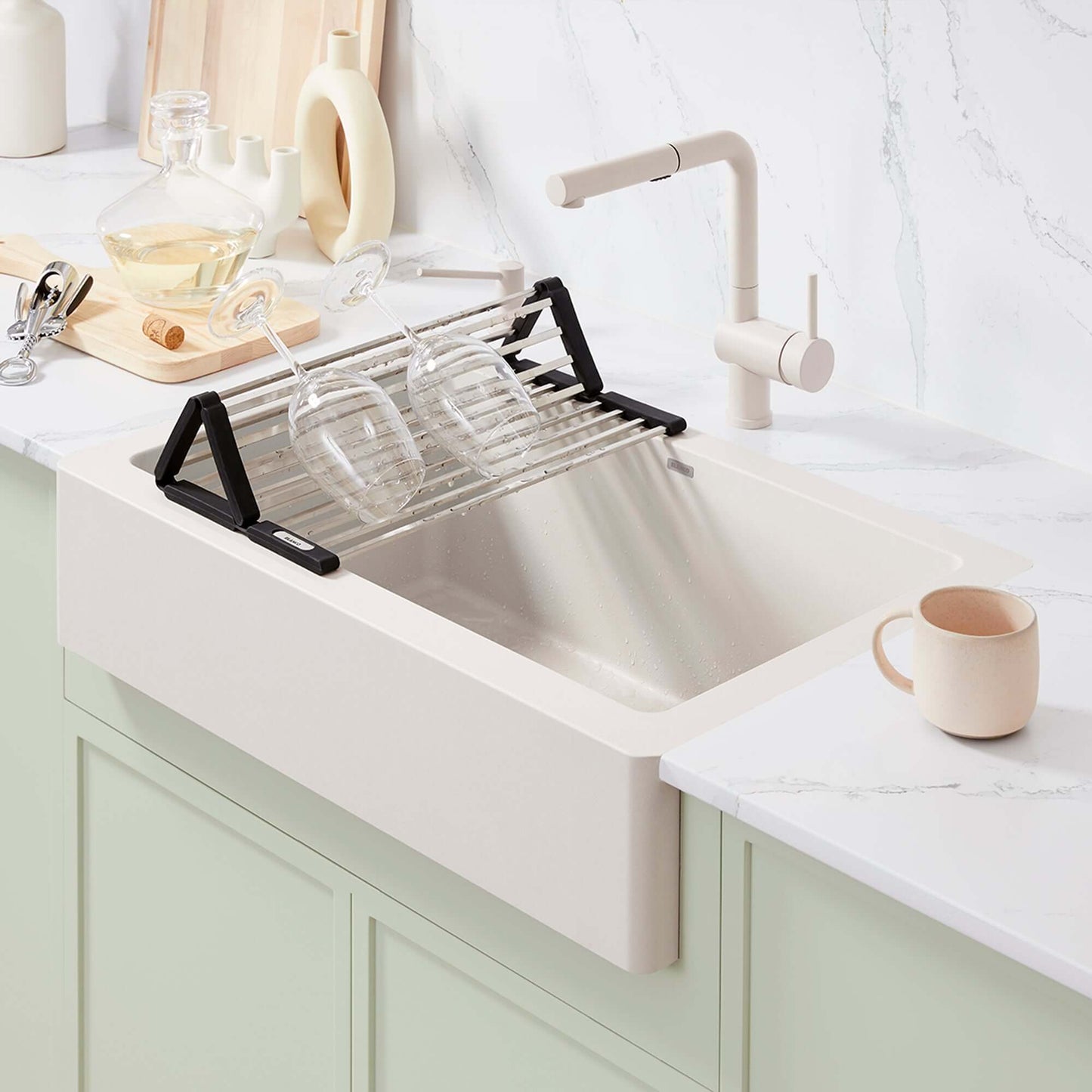 BLANCO Linus Low Arc Pull-Out Dual-Spray Kitchen Faucet - Soft White displayed in a modern kitchen sink setup.