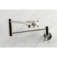 Kingston Brass KS4103BEX Essex Wall Mount Pot Filler Faucet, Antique Brass design with swing arms and faucet handles.