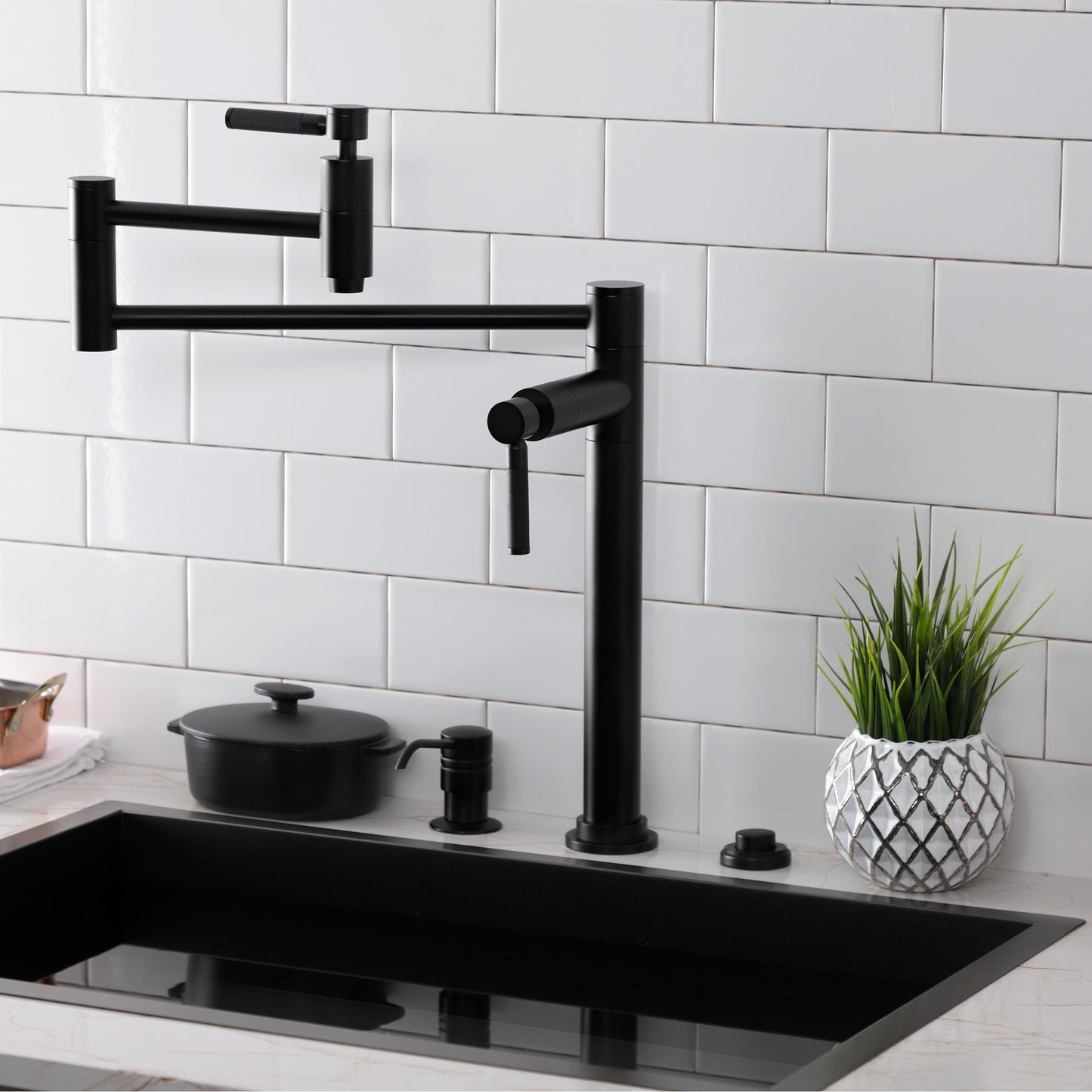 Kingston Brass KS8707DKL Kaiser Deck Mount Pot Filler Faucet, Brushed Brass in a modern kitchen setting.