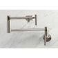 Kingston Brass KS4103CML Manhattan Wall Mount Pot Filler Faucet, Antique Brass on marble background