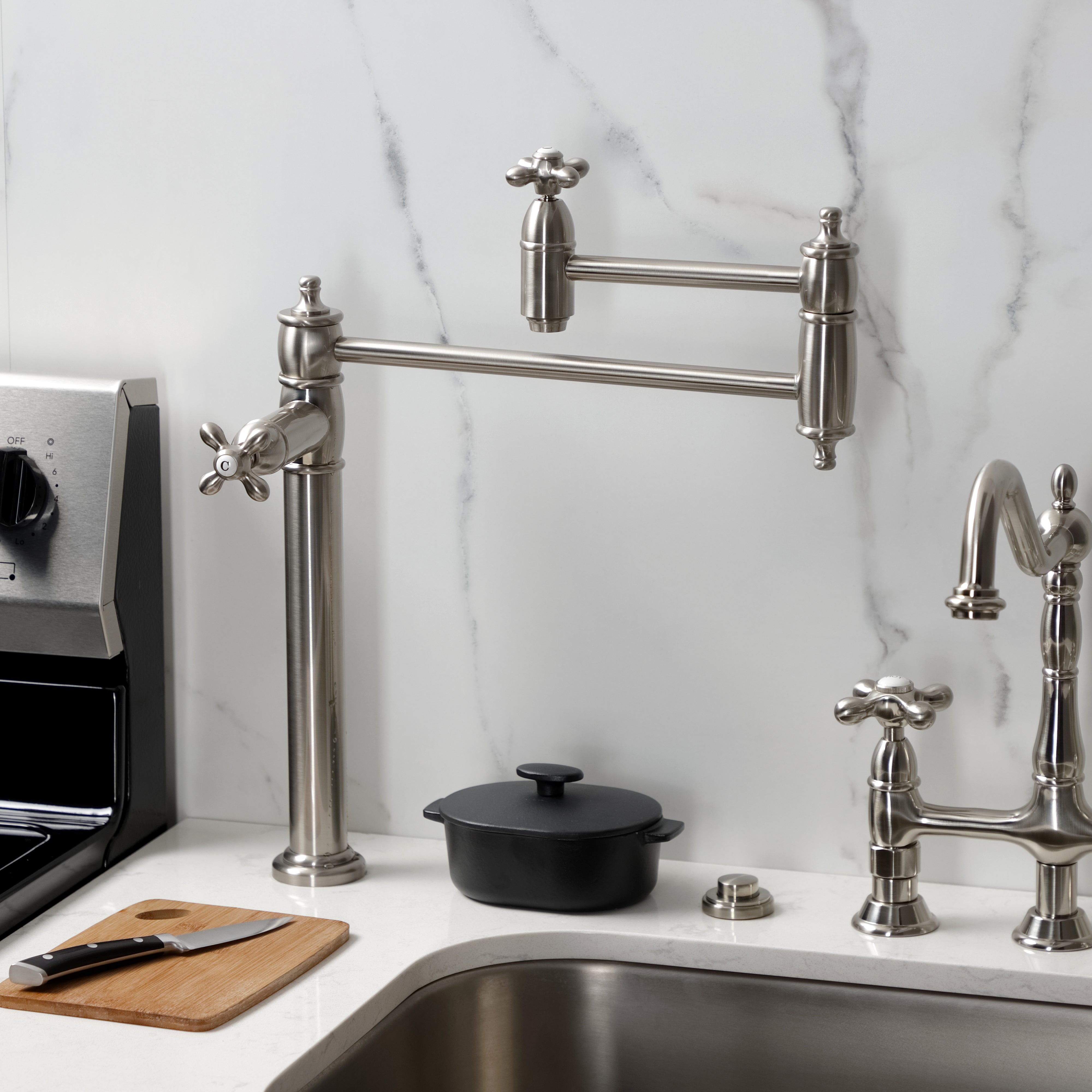 Kingston Brass KS3703AX Restoration Deck Mount Pot Filler Faucet, Antique Brass in a stylish kitchen setting.