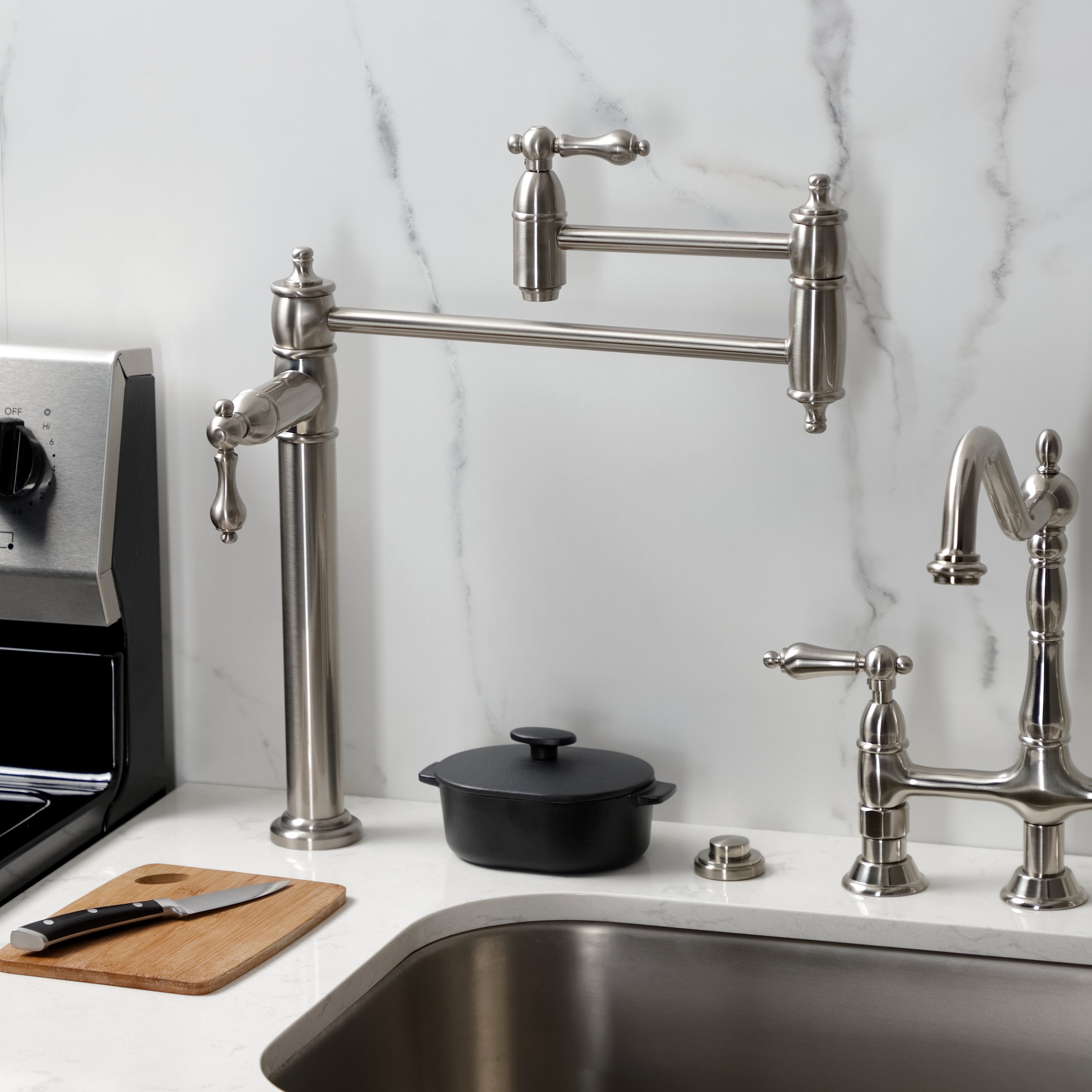 Kingston Brass KS3703AL Restoration Deck Mount Pot Filler Faucet, Antique Brass in modern kitchen setting