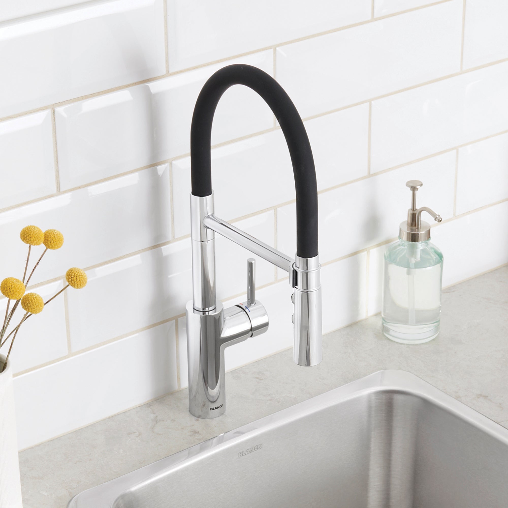 BLANCO Catris Flexo Semi-Pro Pull-Down Dual-Spray Kitchen Faucet with flexible hose design in modern kitchen.