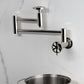Kingston Brass KS8103RX Belknap Wall Mount Pot Filler Faucet, Antique Brass, stylish design with foldable swing arms.