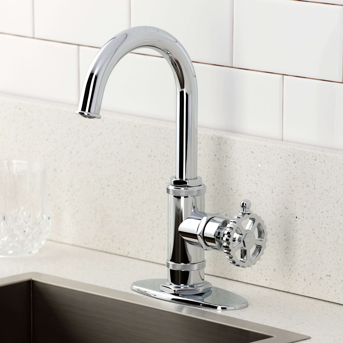 Kingston Brass KSD8503CG Fuller Single-Handle Bar Faucet, Antique Brass in a modern kitchen setting.