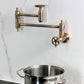 Kingston Brass KS3103RKX Webb Wall Mount Pot Filler Faucet with Knurled Handle, Antique Brass