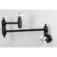 Kingston Brass KS310PXAC Restoration Wall Mount Pot Filler Faucet, Antique Copper with white handles and extendable arm.
