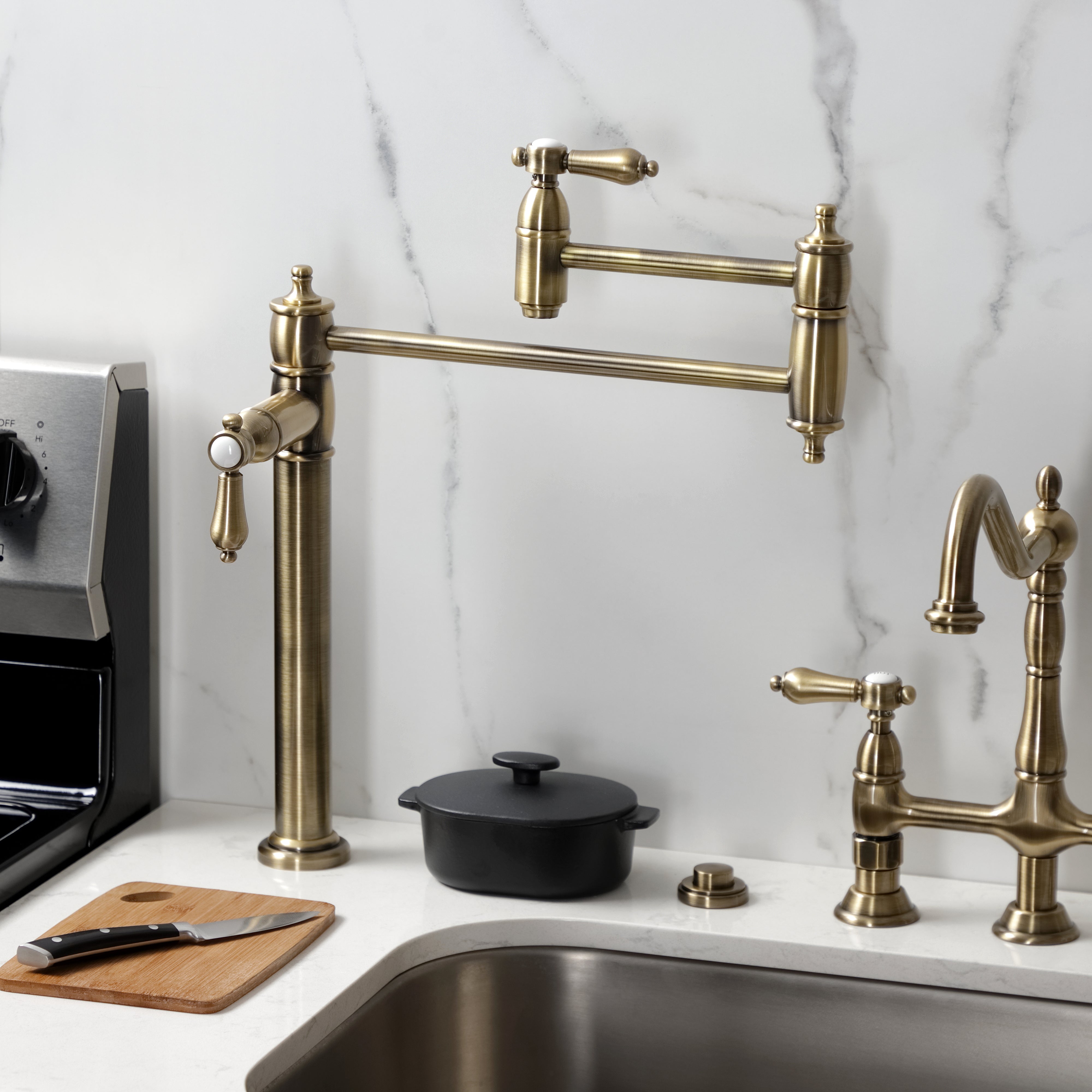 Kingston Brass KS3703BAL Heirloom Deck Mount Pot Filler Faucet, Antique Brass in a stylish modern kitchen.