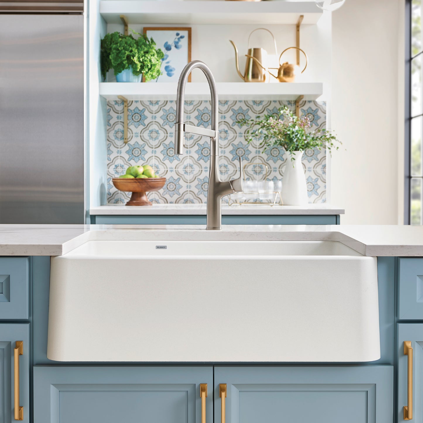 BLANCO Ikon SILGRANIT 33" Double Bowl Apron-Front Farmhouse Sink with Low Divide showcased in a stylish kitchen setting.