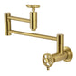 Kingston Brass KS8103CG Fuller Wall Mount Pot Filler Faucet, Antique Brass design with foldable swing arms and fine detailing.