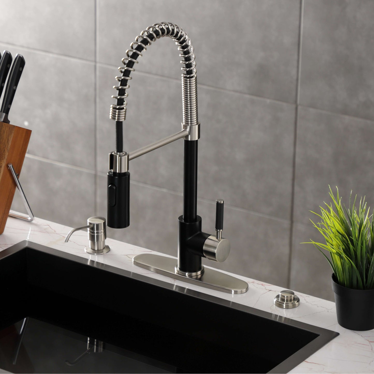 Kingston Brass LS8773DKL Kaiser Pre-Rinse Kitchen Faucet from top right view with modern design and high-arching spout.