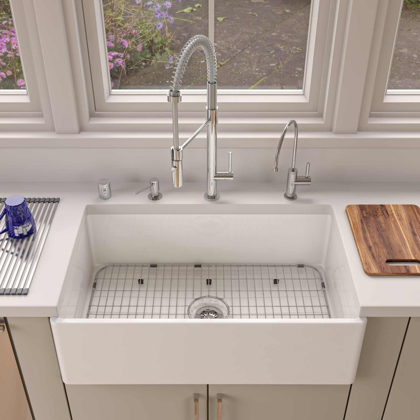ALFI 33" White Smooth Apron Single Bowl Fireclay Farm Sink AB533-W displayed in a modern kitchen with elegant fixtures.