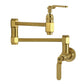 Kingston Brass KS5103KL Whitaker Wall Mount Pot Filler Faucet, Antique Brass kitchen fixture with stylish industrial design.