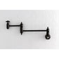 Kingston Brass KS3103AX Restoration Wall Mount Pot Filler Faucet, Antique Brass with a stylish black finish.