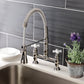 Gourmetier GS1273PX Heritage Double-Handle Deck-Mount Pre-Rinse Bridge Kitchen Faucet, Antique Brass in a modern kitchen setting.