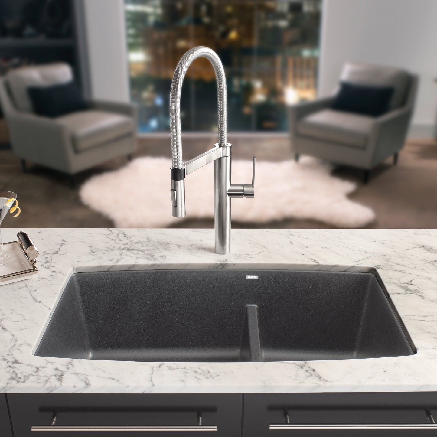 BLANCO Performa SILGRANIT 33" 60/40 Double Bowl Undermount Kitchen Sink with Low Divide featuring modern faucet and marble countertop.