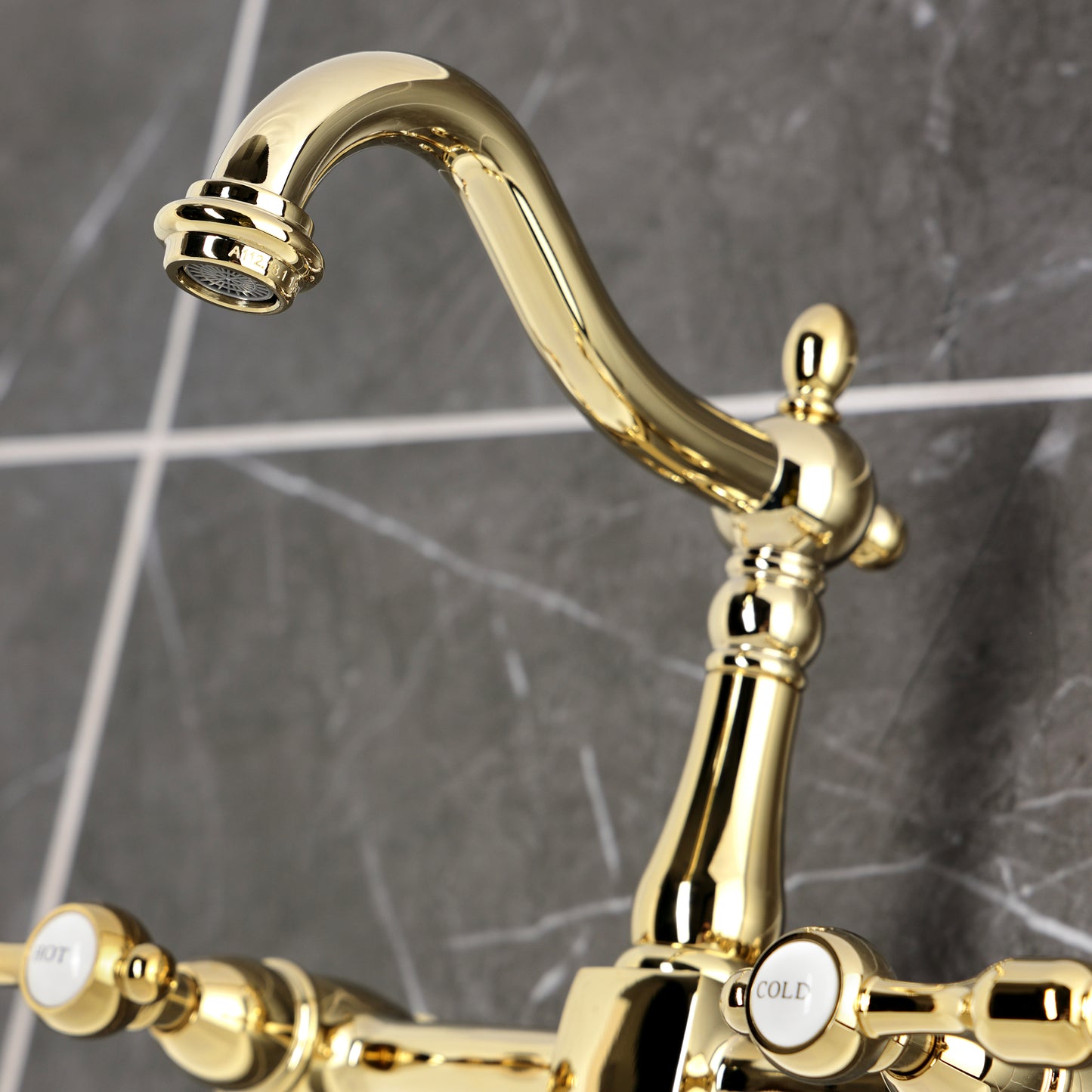 Kingston KS1263TAL Tudor Two-Handle Wall Mount Bridge Kitchen Faucet, Antique Brass detail