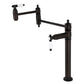 Kingston Brass KS3703BPL Bel-Air Deck Mount Pot Filler Faucet, Antique Brass, with white porcelain levers and oil rubbed bronze finish.