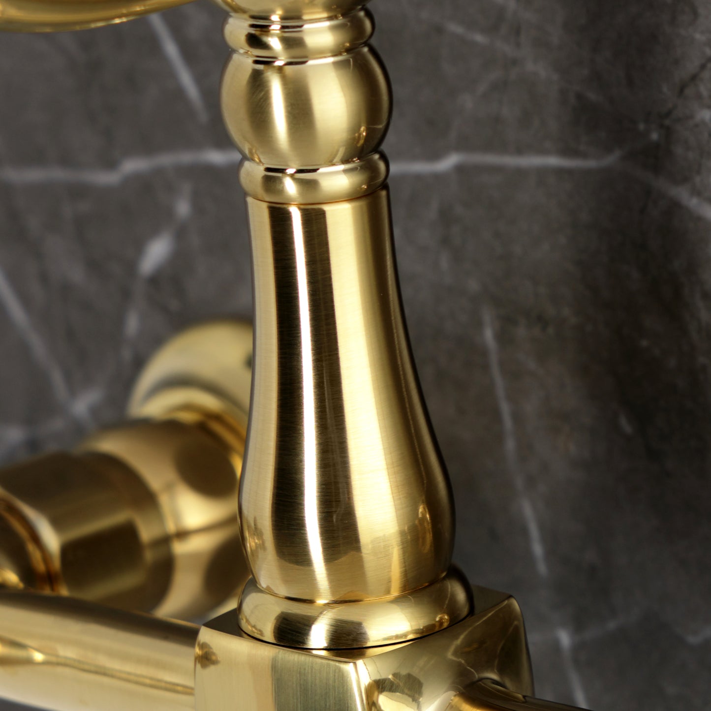 Kingston KS1263WLL Willshire Two-Handle Wall Mount Bridge Kitchen Faucet, Antique Brass close-up detail
