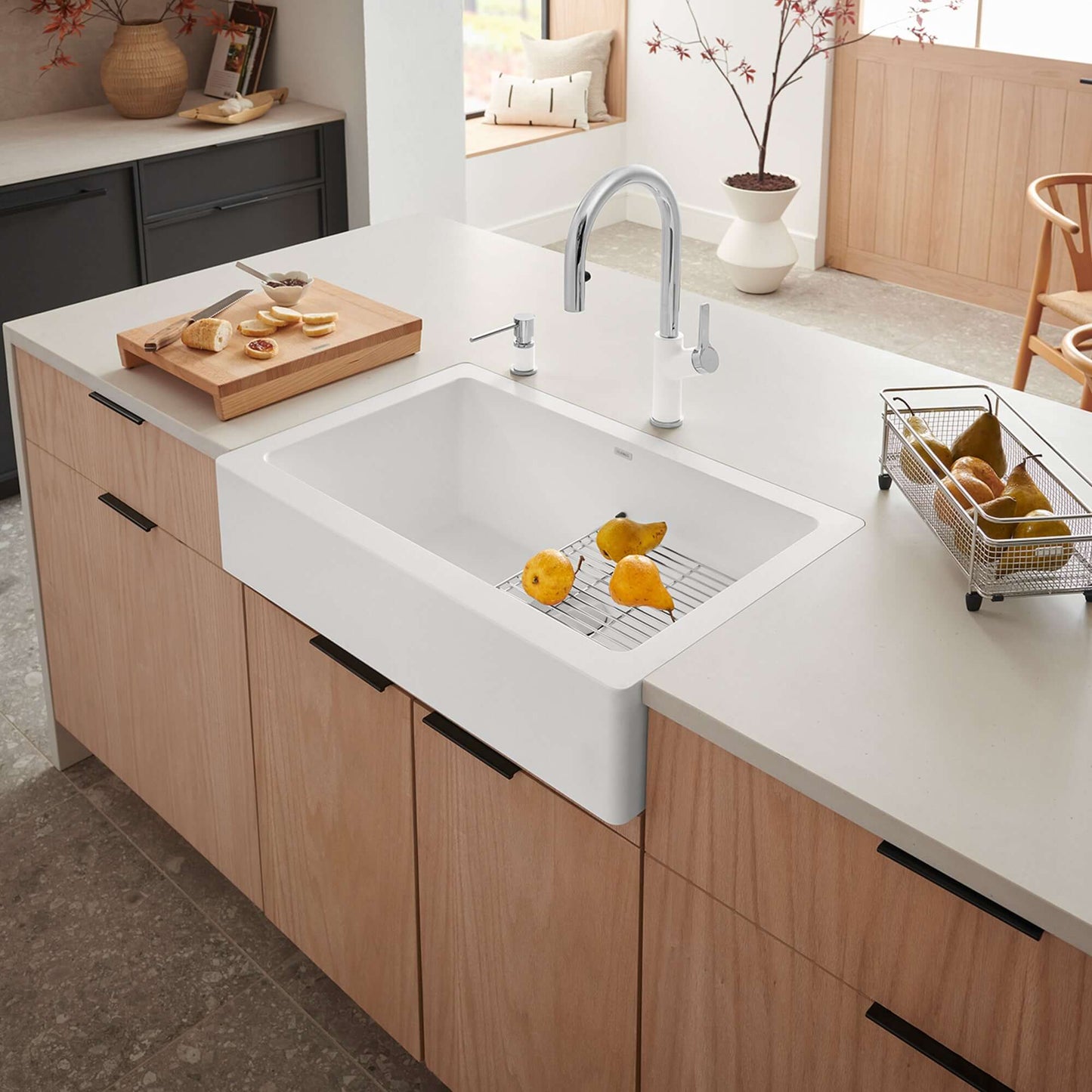 BLANCO VINTERA 30" SILGRANIT Single Bowl Farmhouse Sink with fresh fruits on the grid in a modern kitchen.