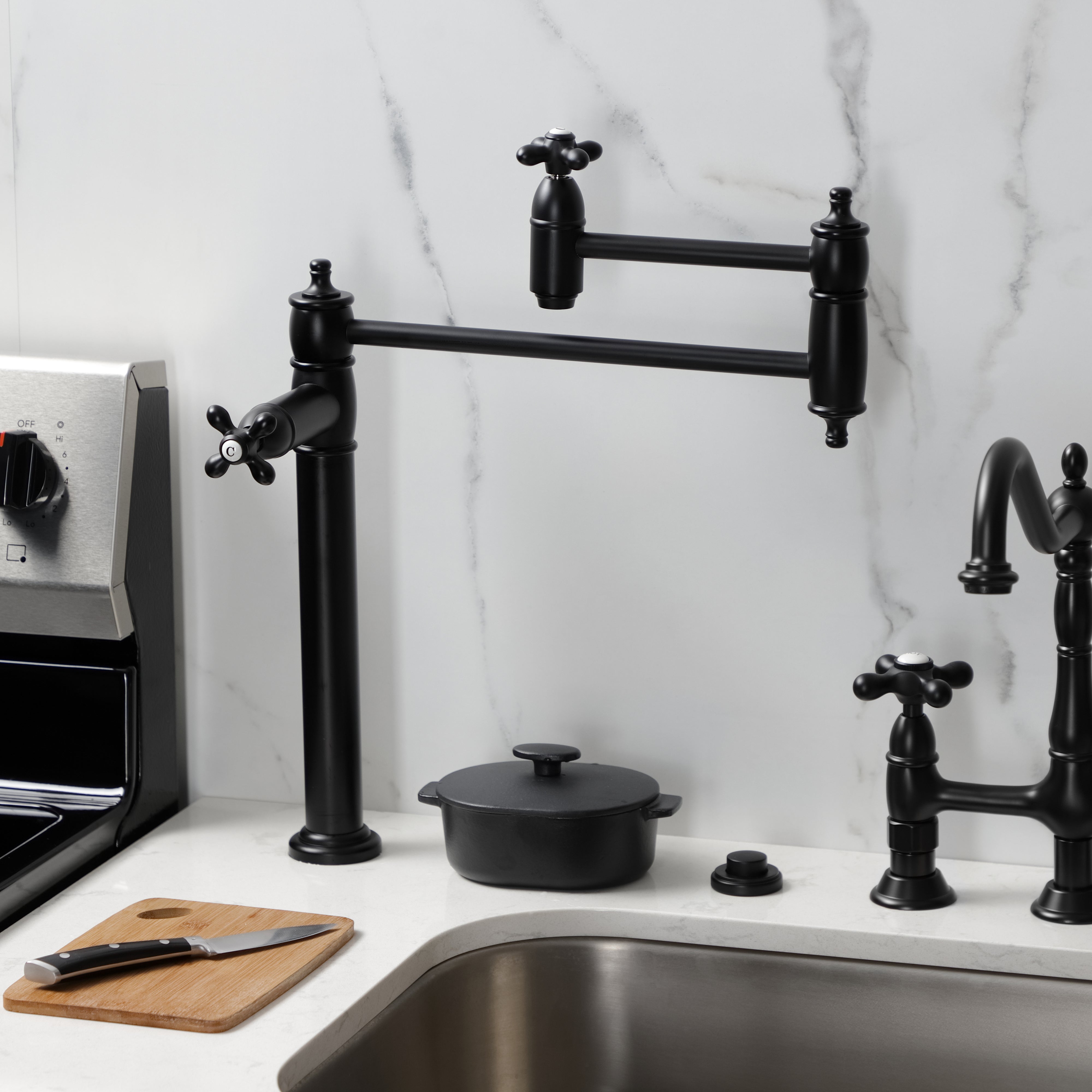 Kingston Brass KS3703AX Restoration Deck Mount Pot Filler Faucet, Antique Brass in a modern kitchen setting.