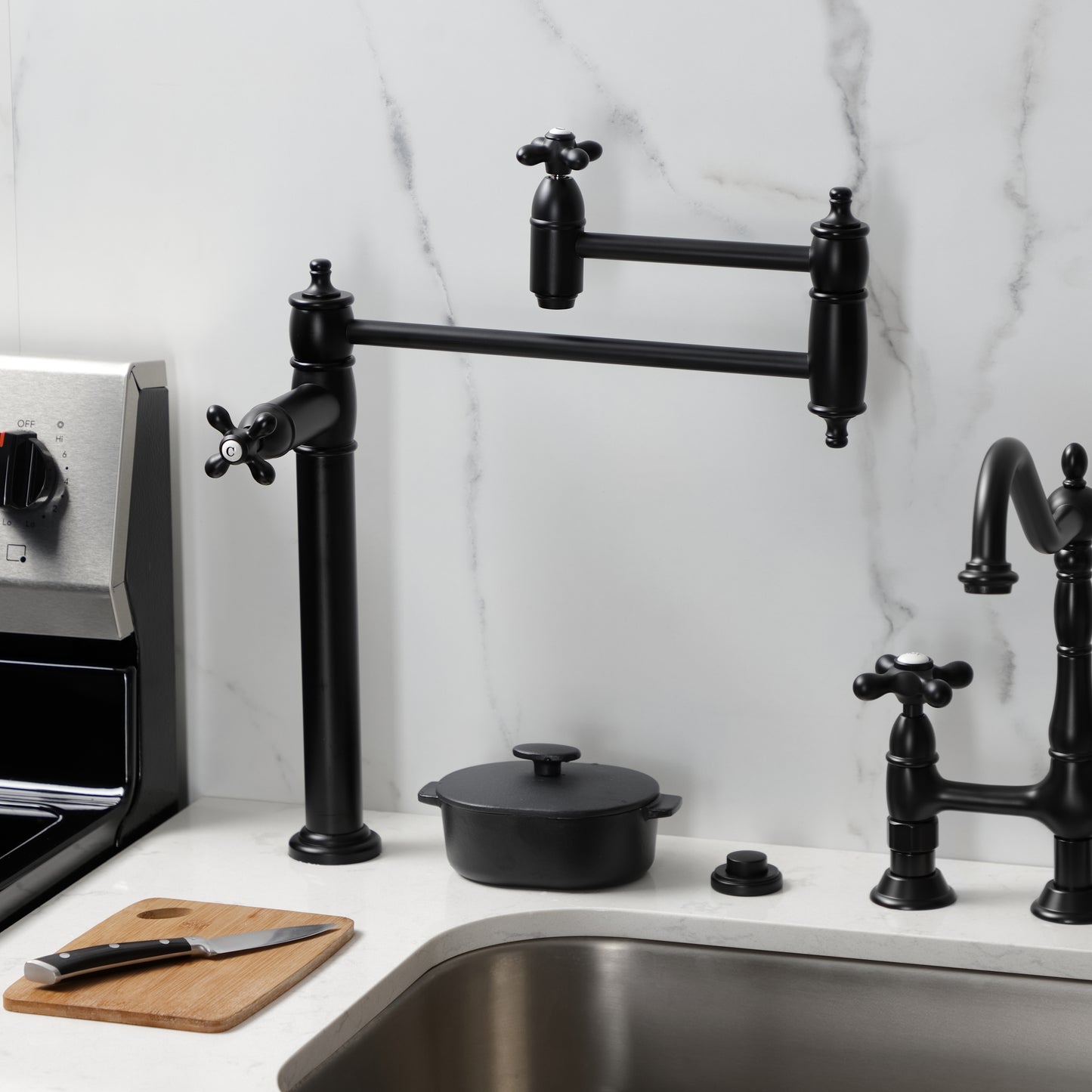 Kingston Brass KS3703AX Restoration Deck Mount Pot Filler Faucet, Antique Brass in a modern kitchen setting.