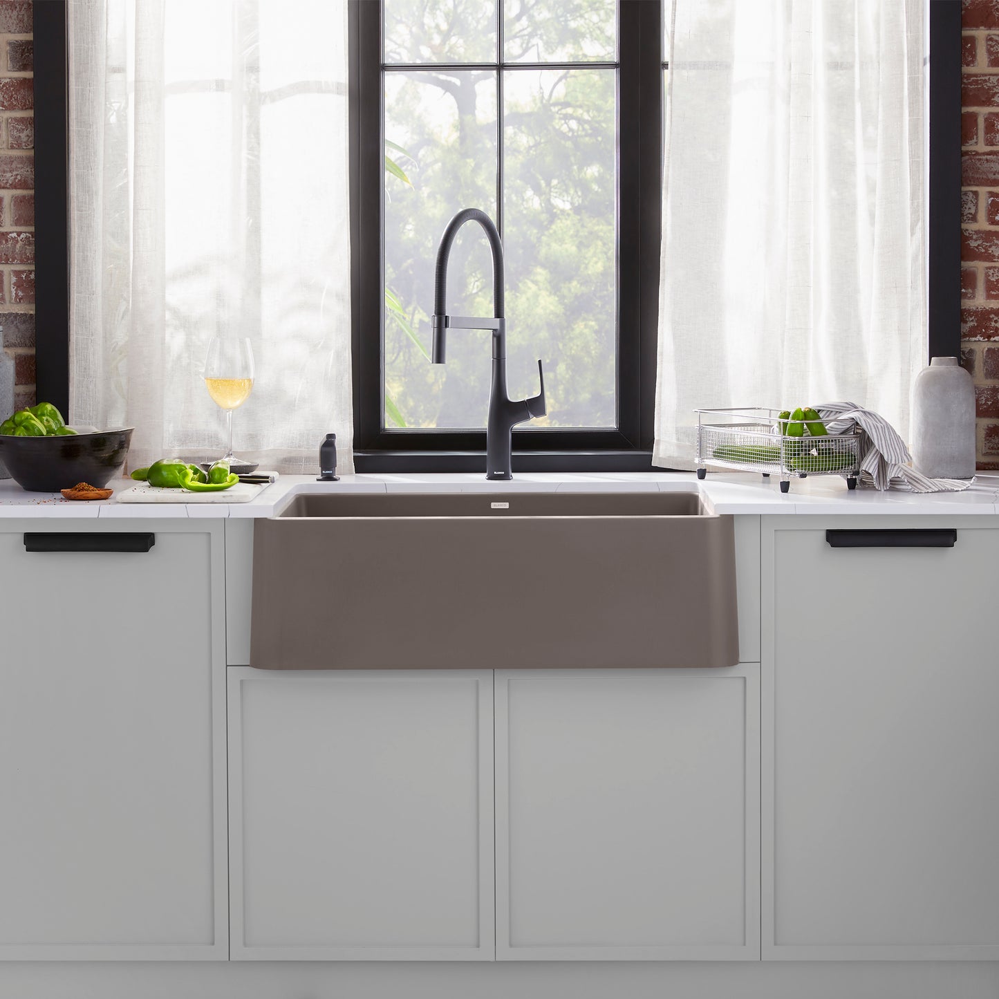 BLANCO Ikon SILGRANIT 30" Single Bowl Apron-Front Farmhouse Sink showcased in a modern kitchen setting.