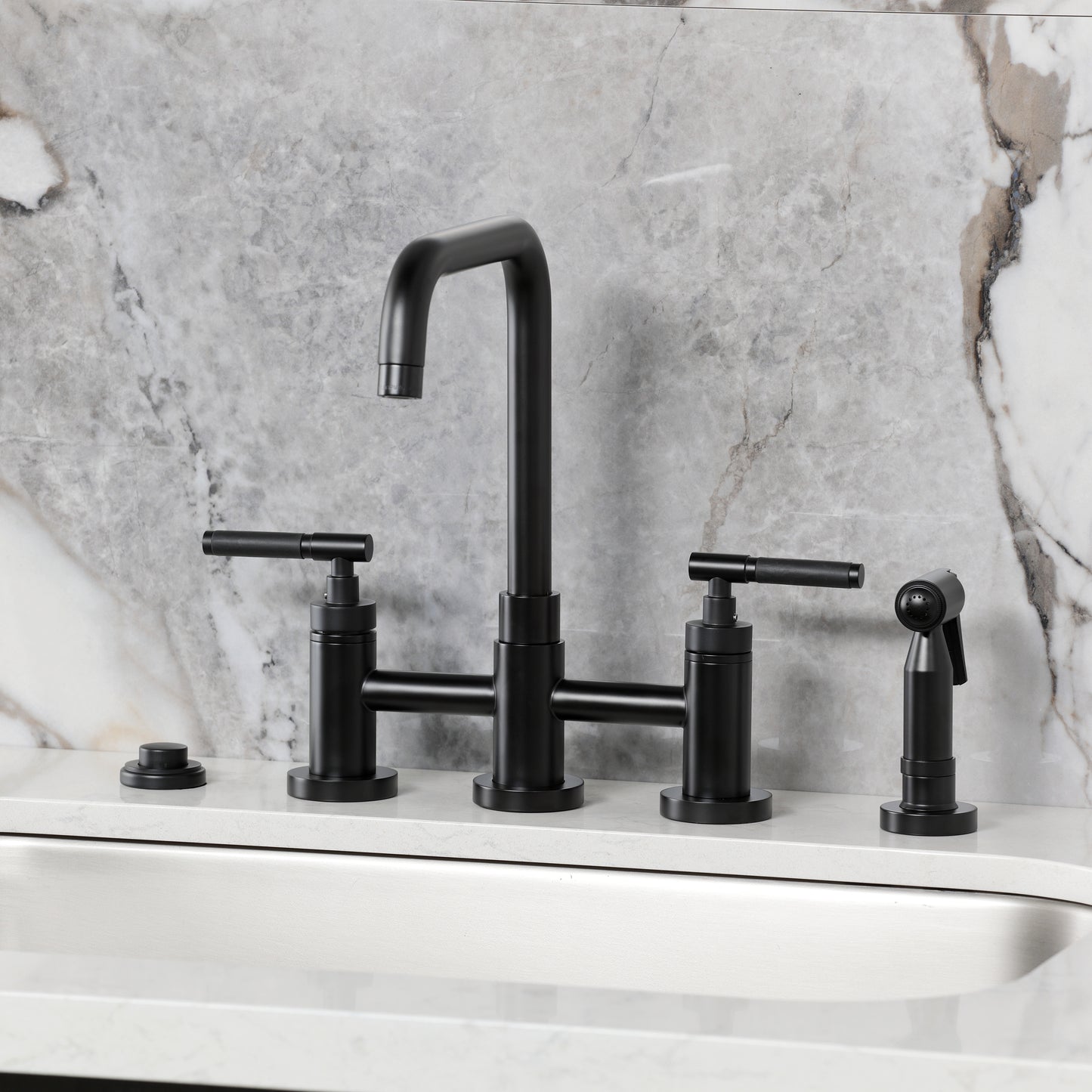 Kingston KS8287CKLBS Kaiser Bridge Kitchen Faucet with Brass Sprayer, Brushed Brass on a modern countertop.
