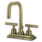 Kingston Brass KS6643CML Manhattan Centerset Bathroom Faucet with high-arc gooseneck and lever handles.